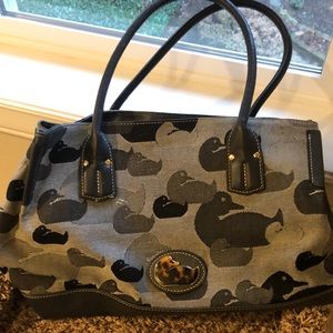 Dooney & Bourke gray canvas and leather satchel